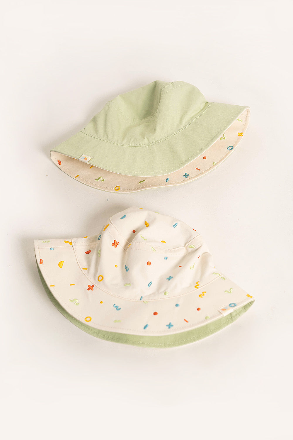 Frolic Embroidery Reversible Bucket Hat