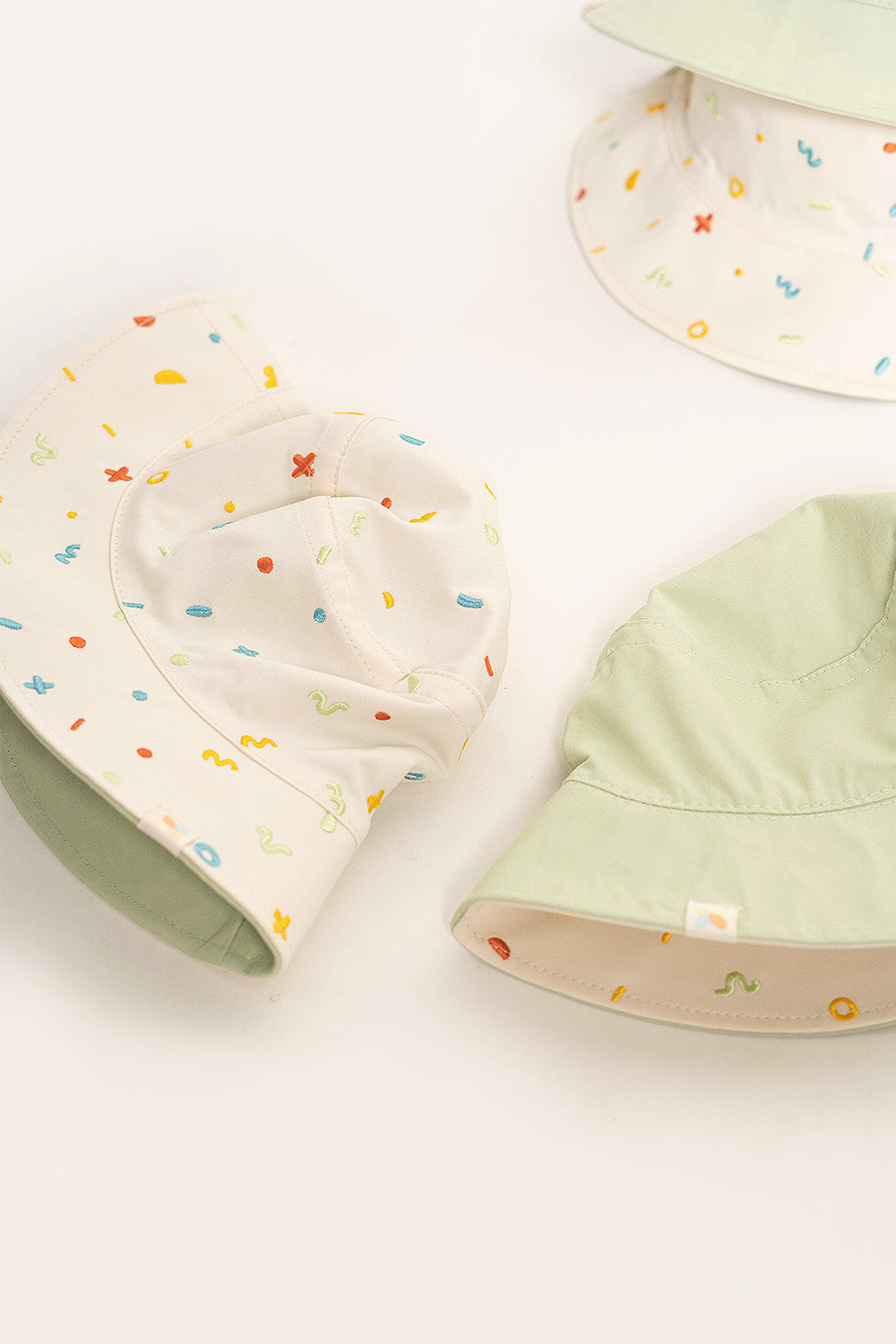 Frolic Embroidery Reversible Bucket Hat